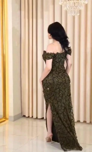 فستان سهرة ترتر زيتي ببطانة باربي