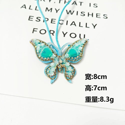 تعليقة فراشة خرز