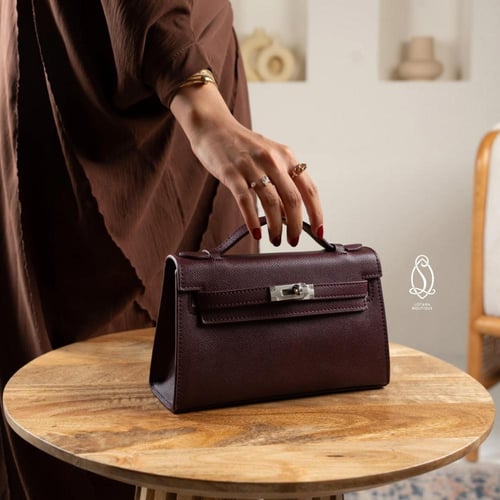 كيلي بوشيت | عنابي