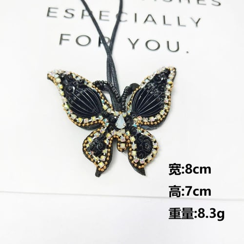 تعليقة فراشة خرز