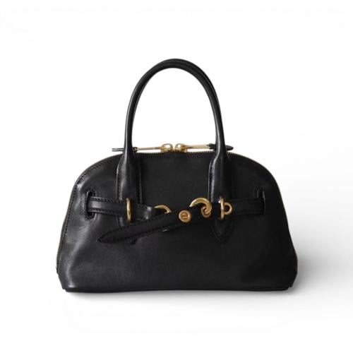 ميو ميو | أسود