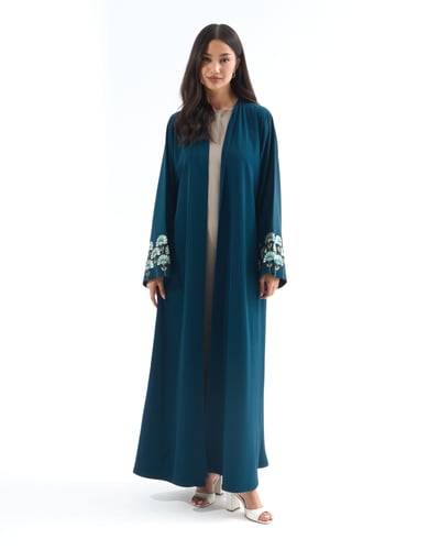 عباية كريب تركواز مع تطريز بقصة نصف كلوش