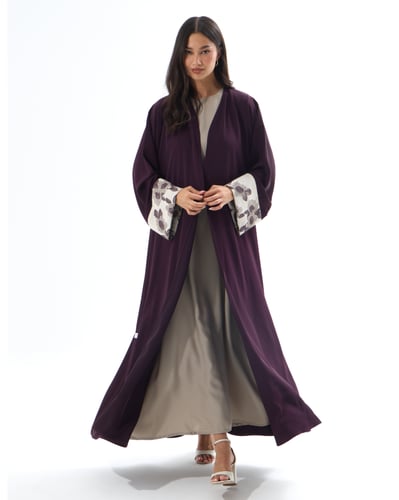 عباية كريب بنفسجي مع لنن مطرز بقصة نصف كلوش