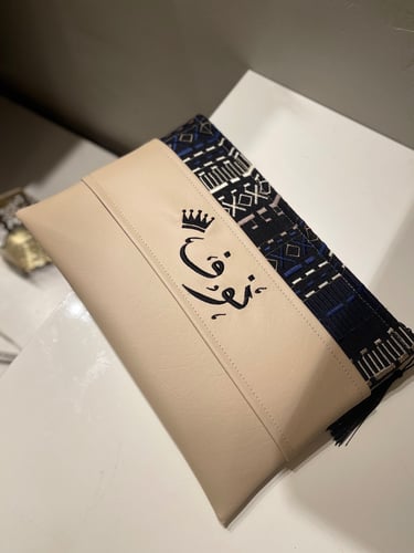 باوتش جلد بيج مع قطعه علويه منقوشه