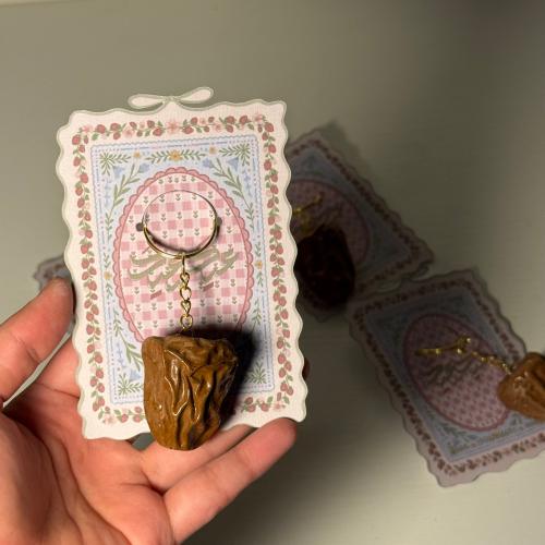 توزيعات العيد ميدالية التمر