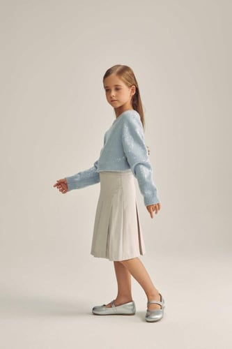 تنورة مزينة بكسرات