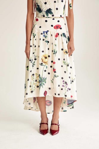 تنورة منقطة بقصة غير متماثلة