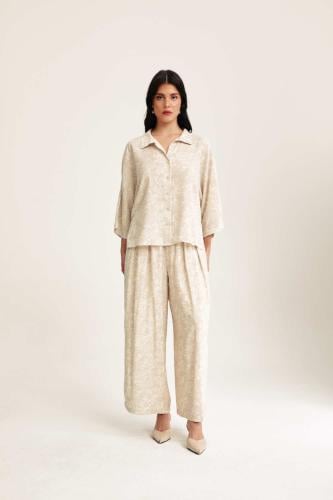 بنطلون مورد بقصة واسعة