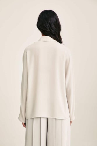 قميص واسع بكسرات