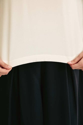 بلوزة فضفاضة بأكمام بالون