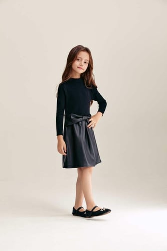 فستان بتنورة جلدوفيونكة