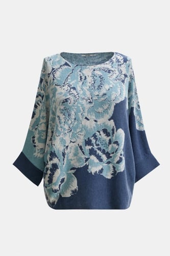 بلوزة واسعة بأكتاف منسدلة