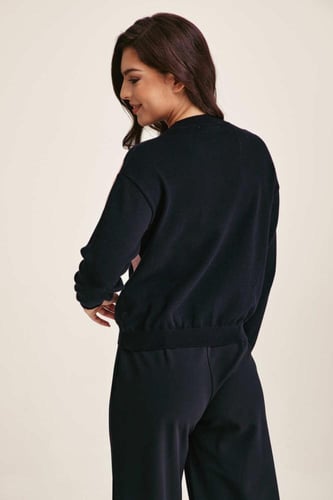 كنزة مزينة بالترتر