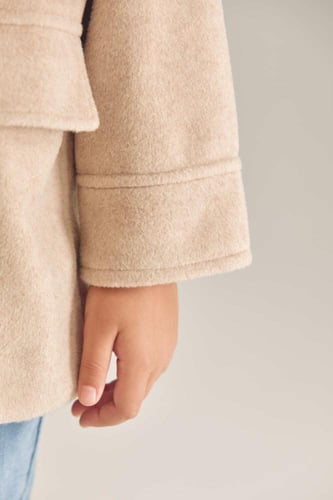 جاكيت بقبّعة وأزرار إغلاق