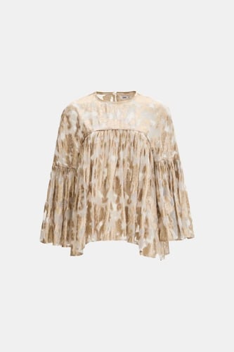 بلوزة بطبعات لامعة