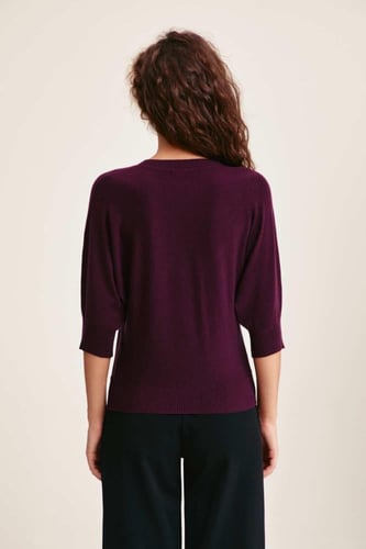 بلوزة محبوكة بفيونكة تول