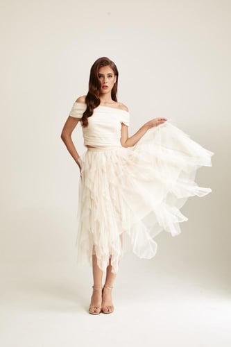 تنورة تول كشكش مزينة بالخرز