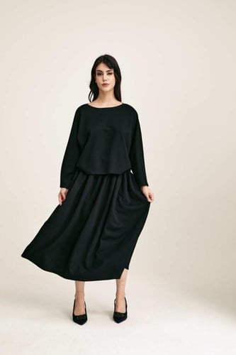 بلوزة بقصة فضفاضة