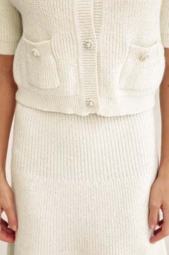 جاكيت محبوك مزين بجيوب