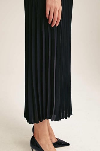 بنطلون واسع بكسرات