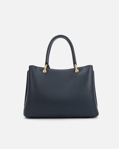 ‎ شنطة نسائية كلاسيك باللون الأزرق