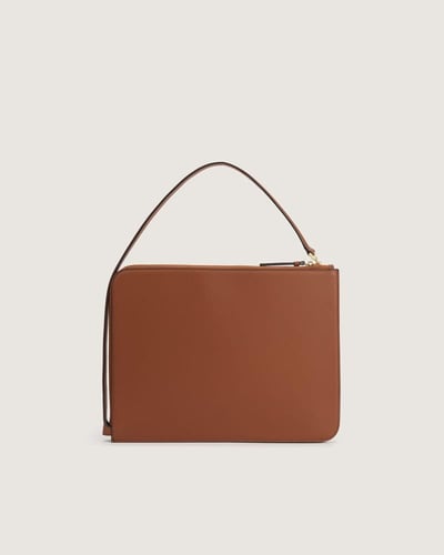 شنط باوتش آن للجنسين من الجلد بلون بني