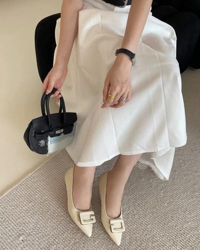 ‎ حذاء نسائي بكعب بلون أبيض