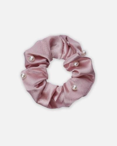 ربطة شعر نسائية باللون الوردي