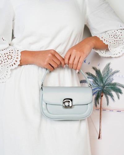 ‎ شنطة نسائية الفي اند كو باللون أزرق فاتح