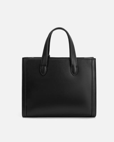 شنطة نسائية مميزة باللون البيج والأسود