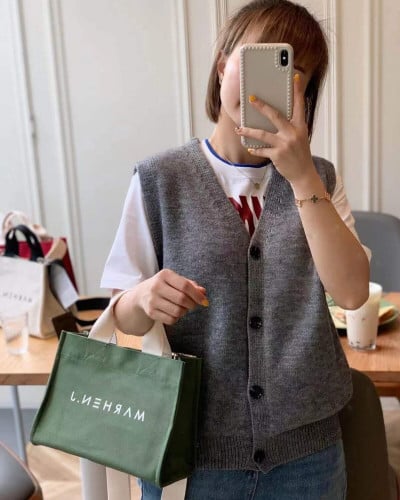 ‎ شنطة يد نسائية بلون أخضر