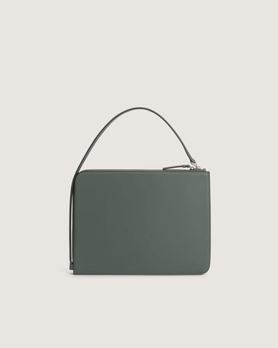 شنط باوتش آن للجنسين من الجلد بلون أخضر