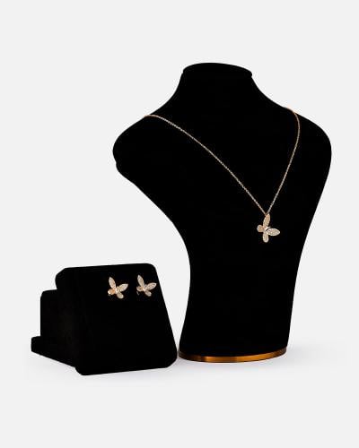 ‎ طقم نسائي بتصميم أنيق بلون ذهبي