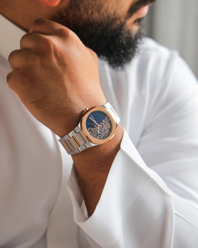 ‎ ساعة رجالية من الفي بلون فضي ونحاس