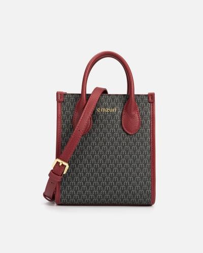 شنطة نسائية مميزة باللون الأسود والعودي