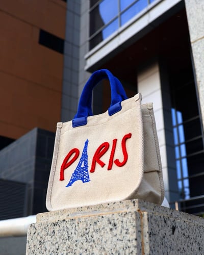 ‎ شنطة نسائية من القماش بلون بيج