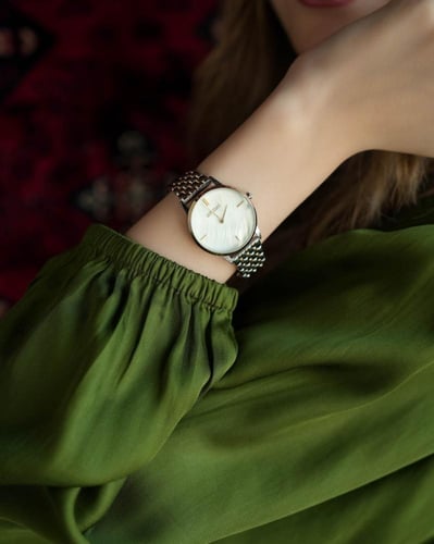 ‎ ساعة نسائية إمزوري بسير ستيل بلون فضي وذهبي