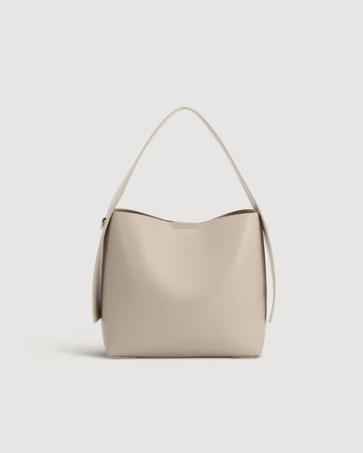 شنطة نسائية الفي اند كو من الجلد بلون بيج