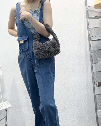 ‎ شنطة نسائية بلون أسود لامع