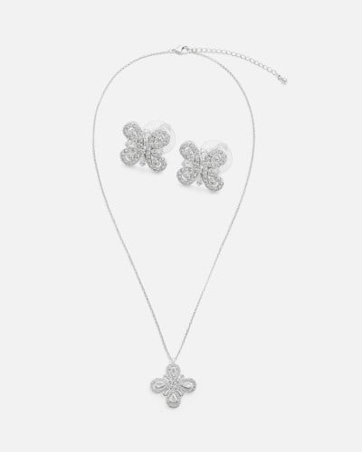 ‎ طقم نسائي أنيق باللون الفضي