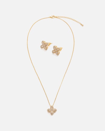 ‎ طقم نسائي أنيق بلون ذهبي