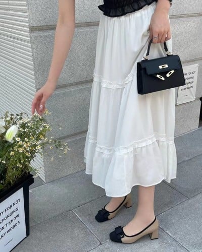 ‎ حذاء نسائي بكعب بلون بني وأسود