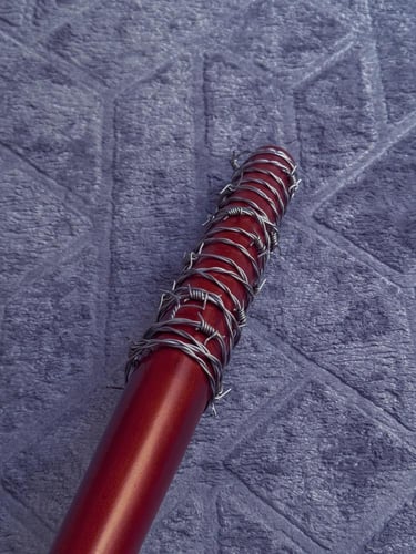 مضرب نيغن "Lucille"