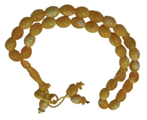 سبحة لون كهرمان الفاتح حجر صناعي عالي الجودة