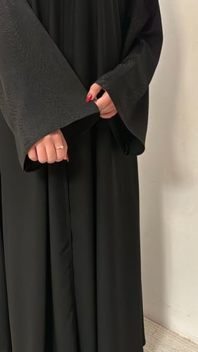 1062 - عباية قماش باربي نص كلوش