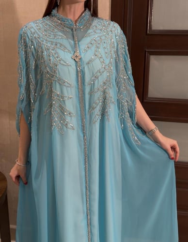 جلابيه لون فيروزي بتطريز فضي
