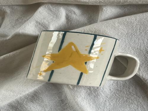 كوب star بكتابه داخل الكوب