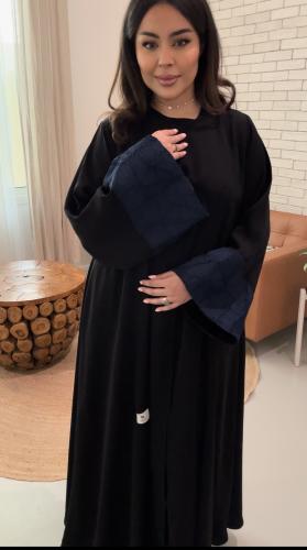 Cloth with cost on the sleeves