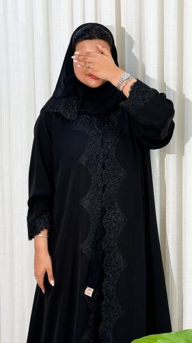 M24 Abaya with a flared design and lace embroidery