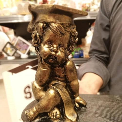 قاعدة مع مجسم تخرج مقاس 35في25سم